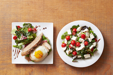 Open sandwich and salad on the table