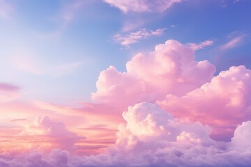 Light pink clouds in a sunset blue sky. Pastel colors of clouds, a natural background for sunrise and sundown