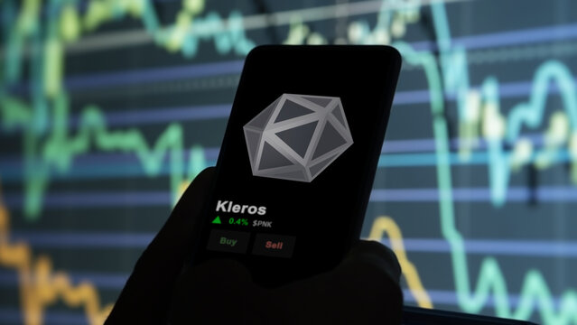 November 17th 2023. An investor analyzing the price of Kleros, the token coin $PNK on a crypto exchange sreen.