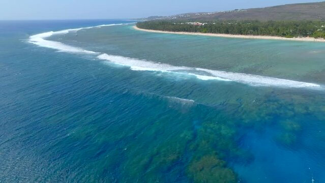 Waves rolling on the reef of Reunion Island, filmed with a drone 