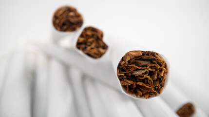 Close up cigarettes on isolated white background.