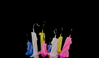 Birthday candles isolated on black background.