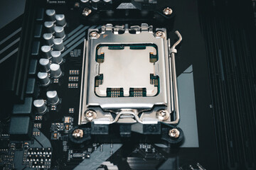 Computer processor from 2023 - CPU sitting in a motherboard on a gaming computer