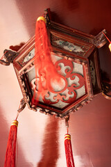 Buddhist lamps hanging high in temples