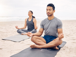 Couple of friends, lotus pose and beach meditation for zen fitness, calm exercise and mindfulness...