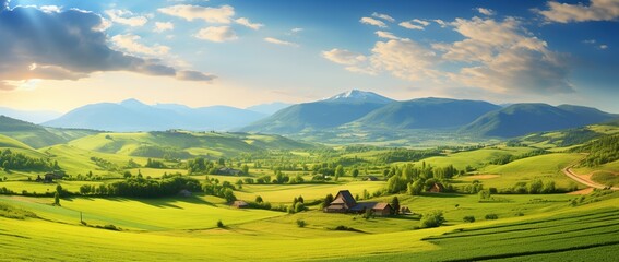 Beautiful landscape with green meadows and blue sky with clouds.
