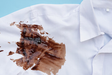 Dirty choclate stain on white shirt