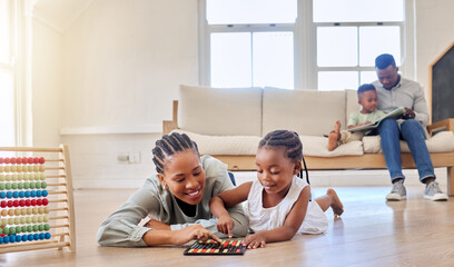 Education, happy and black woman playing with child on the floor in the living room at modern home....