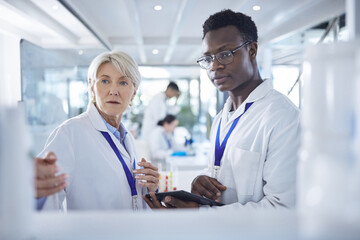 Student, medical and tablet with professor for research, disease analysis and collaboration in...