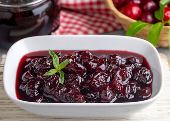 Jars with freshly homemade cherry jam, sour cherry jam, Turkish name; Visne receli