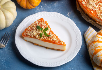 Handmade delicious pumpkin cheesecake and small pumpkins, Turkish name; balkabakli cheesecake. Pumpkin dessert.
