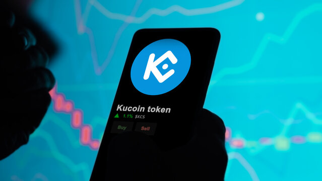 November 17th 2023. An investor analyzing the price of kucoin token, the token coin $KCS on a crypto exchange sreen.