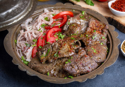 Traditional Turkish Liver kebab cuisine. Leaf Liver spicy. Delicious turkish ciger. (Turkish name; yaprak ciger)