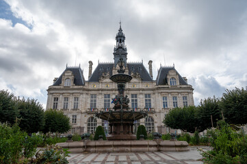 Fototapeta premium Views of streets and houses of Limoges town, Haute-Vienne department, France with famous porcelain and leather industry, city hall fountain