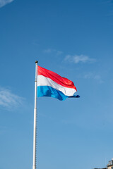 Views of flag of Luxembourg country and blue sky  in Luxembourg or Luxembourg City capital city and one of de facto capitals of European Union