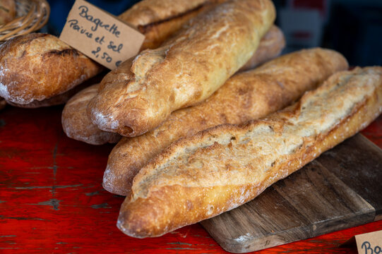 French artisan bakery in Bordeaux, rye and wheat bread and baguettes, English translate - baguette with salt and pepper, France, french food