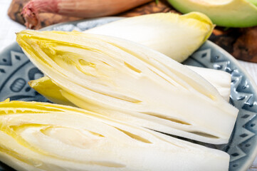 Fresh organic chicory endive salad ready to eat, traditional food in Belgium and the Netherlands