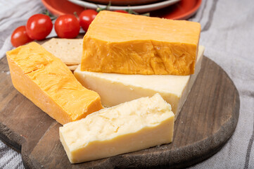 British cheeses collection, Scottish coloured and English matured cheddar cheeses
