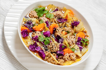 egg roll cabbage soup in bowl, top view