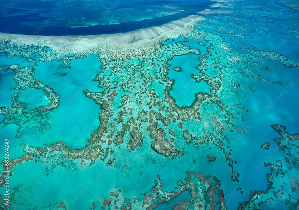 Wall mural aerial view of the coral reefs of the whitsunday islands off the coast of queensland, australia. - Wall murals