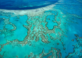 Aerial view of the coral reefs of the Whitsunday Islands off the coast of Queensland, Australia.