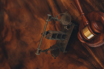 Justice and law concept.Male judge in a courtroom with the gavel, working with, computer and...