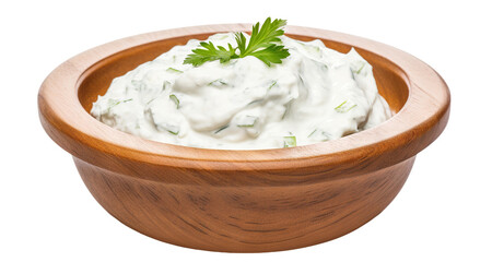 Delicious tzatziki sauce in a wooden bowl, cut out - obrazy, fototapety, plakaty