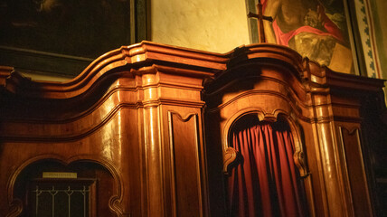Traditional holy confessional in cathedral