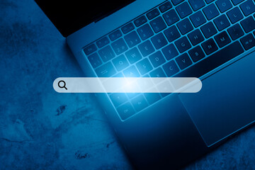 Laptop keyboard top view with VR search bar. SEO. Browser technology. Concept of searching on...