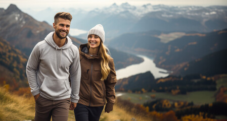 Obraz na płótnie Canvas couple hiker walking on the top of the mountain