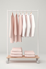 Rack with clothes on hangers isolated on flat pastel background with copy space. Creative vertical concept of designer clothes exhibition, branding of employees uniforms.