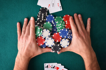 Winner with poker of aces versus loser without game