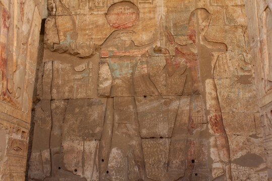 Inscriptions on the walls and columns of seti 1 temple in Abydos in Sohag in Egypt