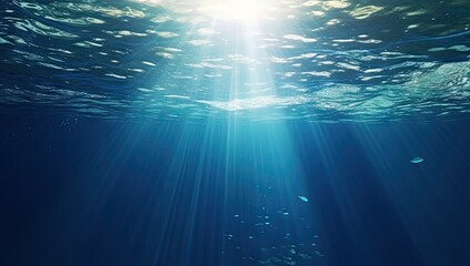 Fototapeta premium Submerged serenity. Tranquil underwater scene with sun rays and clear blue ocean. Sunlit depths. Abstract background with bright sunbeams and clear sea