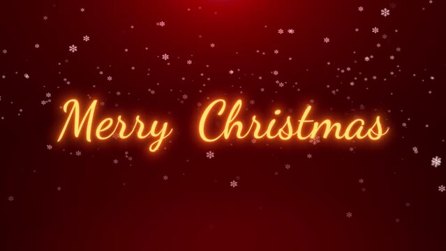Merry Christmas animation with golden text and falling snowflakes and snow. Winter holiday 4k video background..