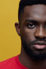 Obraz premium american man american beige fashion background portrait head orange african guy red black