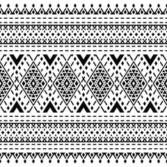 Aztec and Navajo tribal background vector. Seamless native ethnic pattern. Geometric stripe style. Black and white colors. Design for carpet, curtain, textile, fabric, mat, embroidery, fashion, ikat.