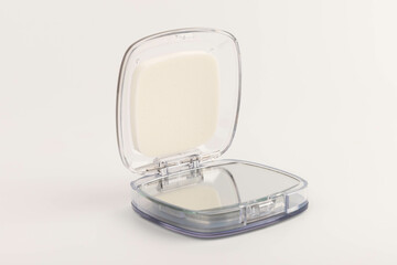 Cosmetic mirror on a white background. Space for text.