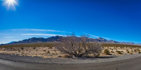 Las Vegas, United States - February 24 , 2013 : The dry desert countryside next to the road during the day between las vegas and los angeles