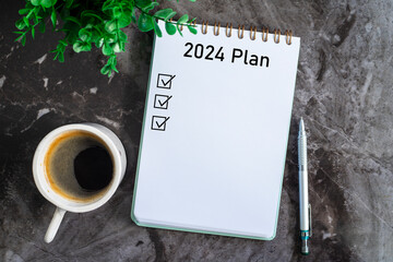  Note book with 2024 goals text on it to apply new year resolutions and plan.