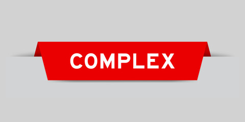 Red color inserted label with word complex on gray background