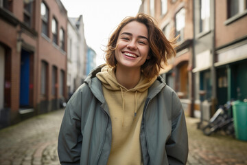 Fototapeta premium Fashionably Free: Candid Portrait of a Joyful Young Lady