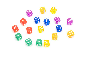 transparent colored dices on white surface