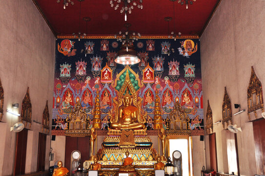 Ancient buddha statue in antique old ubosot for thai people traveler travel visit respect praying blessing wish holy myth mystery at Wat Chong Lom temple on January 25, 2008 in Samut Sakhon, Thailand