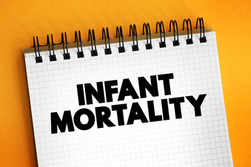 Infant Mortality is the death of an infant before his or her first birthday, text on notepad