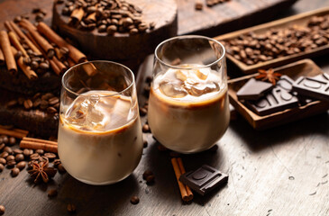 Cream and coffee cocktail in glasses with ice.