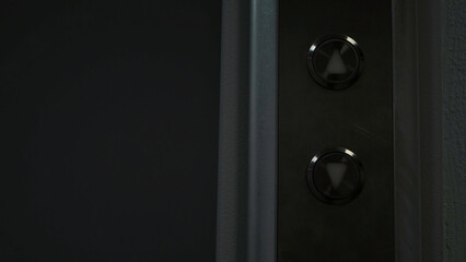 Close up of man or woman getting inside an elevator. Concept. Elevator door opens and closes.