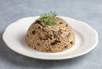Traditional delicious Turkish food; rice pilaf with pine nuts and currants (Turkish name; ic pilav or pilaf)