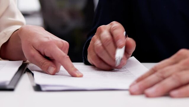Legal broker reviewing contract documents