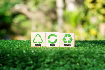 icons related to reduce, reuse, recycle on green background blocks The concept of reduce, reuse,...